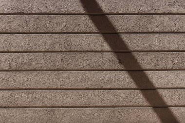 Boş sıva duvarı tasarım için eşsiz bir arkaplan sağlıyor