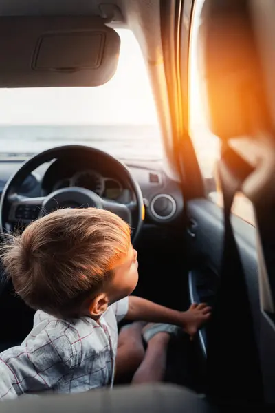 Cute Little Boy Looking Out Window Car Sunset Beach — Stock Photo, Image
