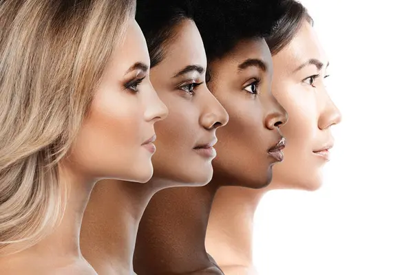 Multi-ethnic diversity and beauty. Group of different ethnicity women against white background