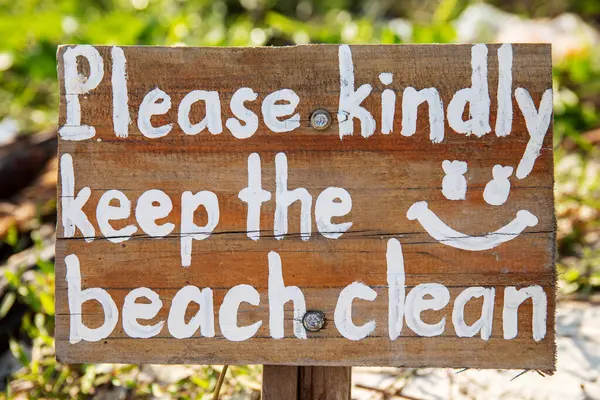 Closeup Sign Saying Please Kindly Keep Beach Clean Royalty Free Stock Images