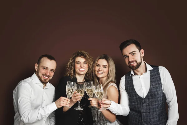 Group Elegantly Dressed People Celebrating Holiday Event Drinking Sparkling Wine Royalty Free Stock Images