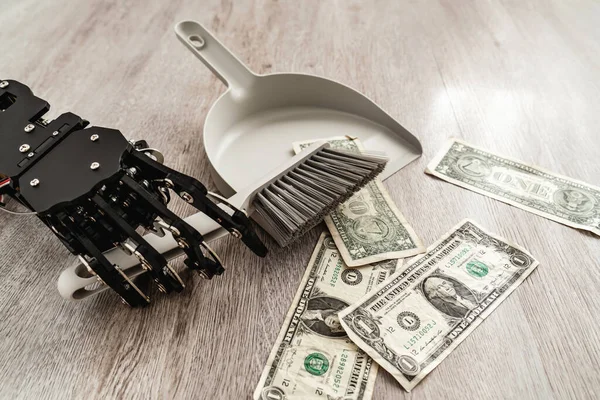 Robotic Hand Wielding Dustpan Brush Meticulously Sweeping One Dollar Bills — Stock Photo, Image