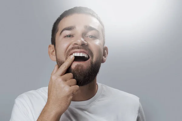 Young Bearded Man Checking His Teeth Health Condition — Stock Photo, Image
