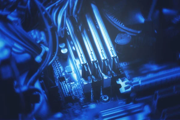 Four sticks of DDR RAM memory inside modern personal computer.