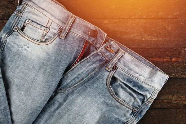 Closeup Unbuttoned Jeans Wooden Background — Stock Photo, Image