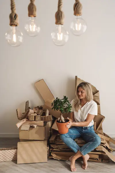 Young Woman Small Ficus Plant Collected Cardboard Waste Home Concepts — Stock Photo, Image