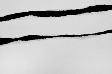 Yırtık Beyaz Kağıt Çarşaf Siyah Arkaplan Ortaya Çıkartıyor.