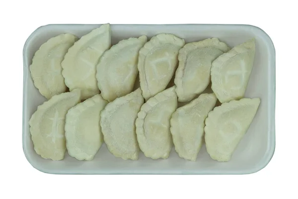 生瓦伦尼克土豆填充在白底板上 乌克兰传统烹饪 顶部视图 — 图库照片