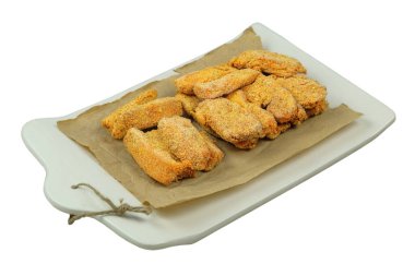 Dondurulmuş portakallı tavuk nugget çubuğu deseni buzdolabında. Ev yemeği. Fast food. Kapat..