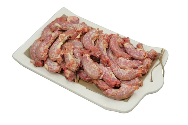 Kippenhalzen Een Keramisch Bord Geïsoleerd Witte Achtergrond Rauw Vlees Van — Stockfoto