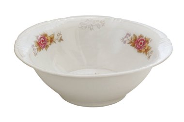 Beyaz arka planda izole edilmiş çiçek desenli bir plaka. Porselen sofra takımı.