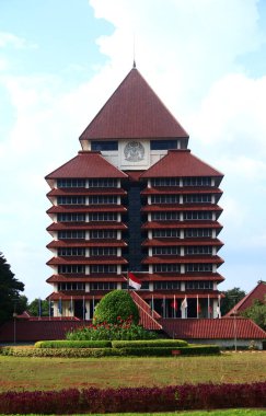 Depok, Indonesia - February 22, 2024: The  rectorate building of the University of Indonesia in West Java. clipart