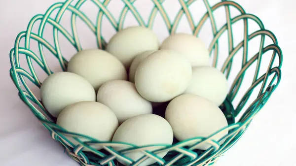 Stock image Duck eggs in a basket. Ready to cook.