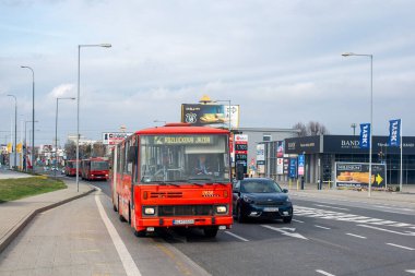 BRATISLAVA, SLOVAKIA - April 02, 2022. Bus Karosa B741 #2636 riding with passengers in the streets of Bratislava.