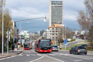 BRATISLAVA, SLOVAKIA - April 02, 2022. Buses Otokar Kent C 18,75 #3336 and 3348 riding with passengers in the streets of Bratislava.