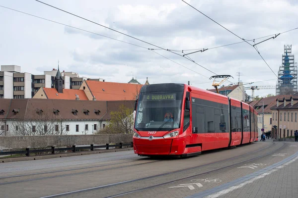 BRATISLAVA, SLOVAKIA - April 03, 2022. Tram Skoda 29T1 #7407 riding with passengers in the streets of Bratislava.