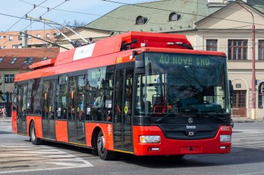 BRATISLAVA, SLOVAKIA - April 11, 2022. Trolleybus Skoda 30TrDG SOR #6102 riding with passengers in the streets of Bratislava.