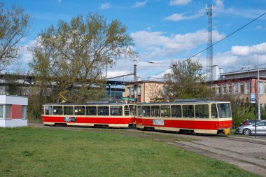 BRATISLAVA, SLOVAKIA - April 11, 2022. Trams Tatra T6A5 #7917 and 7918 riding with passengers in the streets of Bratislava.