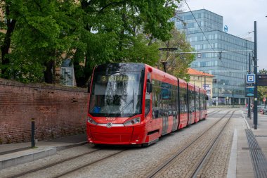 BRATISLAVA, SLOVAKIA - April 23, 2022. Tram Skoda 30T2 #7522 riding with passengers in the streets of Bratislava.