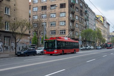 BRATISLAVA, SLOVAKIA - April 23, 2022. Trolleybus Skoda 30Tr SOR #6017 riding with passengers in the streets of Bratislava.