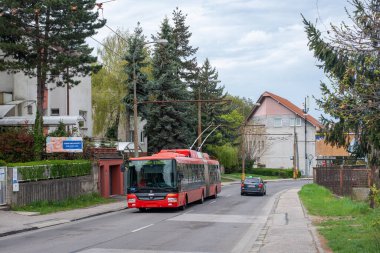 BRATISLAVA, SLOVAKIA - April 24, 2022. Trolleybus Skoda 31Tr SOR #6826 riding with passengers in the streets of Bratislava.