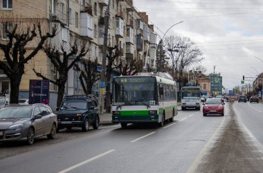 CHERNIVTSI, UKRAINE - February 03, 2020. Trolleybuses Skoda 21Tr #372 (ex. Plzen #495) and Skoda 14Tr #380 (ex. Kosice #2006) riding with passengers in the streets of Chernivtsi. 