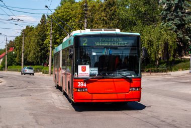 CHERNIVTSI, UKRAINE - May 18, 2020. Trolleybus Hess SwissTrolley 2 #394 (ex. Biel #85) riding with passengers in the streets of Chernivtsi. 