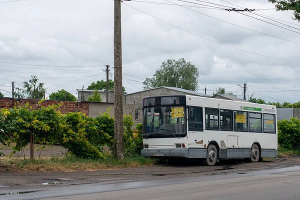 stock image CHERNIVTSI, UKRAINE - June 12, 2023. Bus Heuliez GX77H riding with passengers in the streets of Chernivtsi.