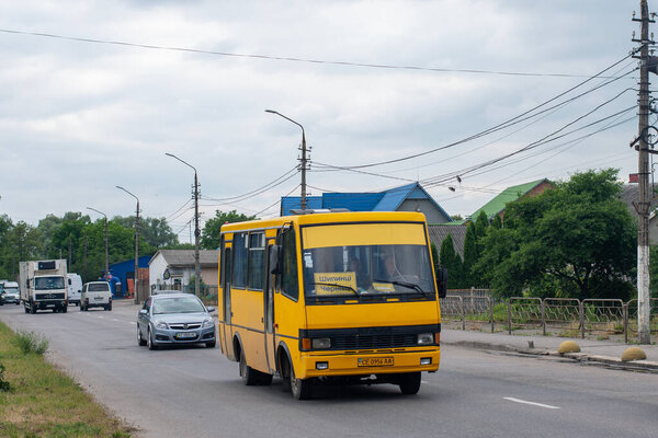 CHERNIVTSI, UKRAINE - June 14, 2023. Bus BAZ-079 riding with passengers in the streets of Chernivtsi.