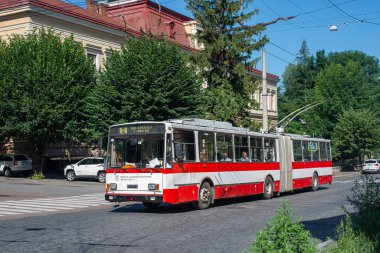 CHERNIVTSI, UKRAINE - July 12, 2023. Trolleybus Skoda 15Tr #401 (ex. Usti nad Labem #556) riding with passengers in the streets of Chernivtsi.