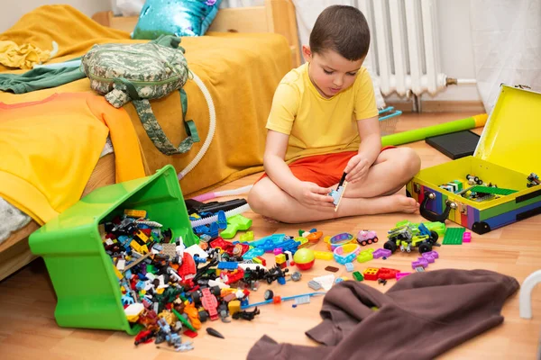 Sad Bored Boy Bright Clothes Sits Floor His Room Looks — Stock Photo, Image