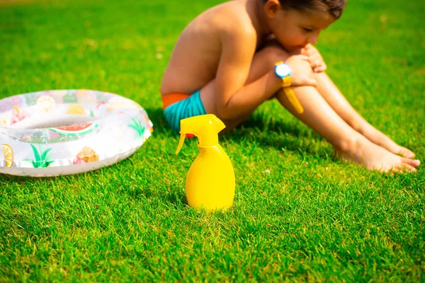 Cute Smiling Boy Sits Green Grass Swimming Trunks Safe Tanning — Stock Photo, Image