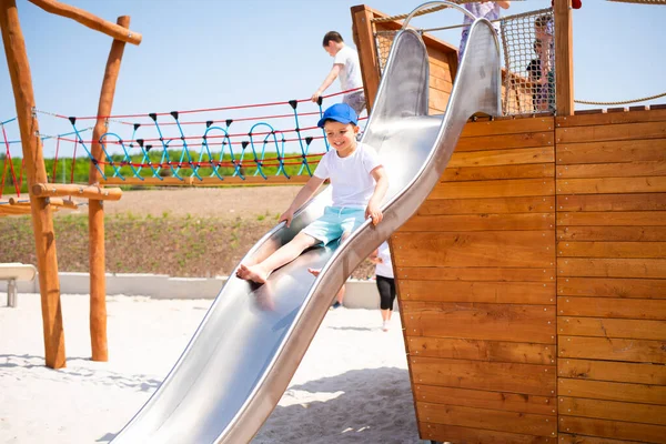 Little Boy Slides Metal Slide Eco Friendly Wooden Playground — Stock Photo, Image