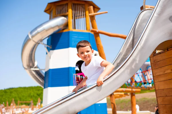 Little Boy Slides Metal Slide Eco Friendly Wooden Playground Background — Stock Photo, Image