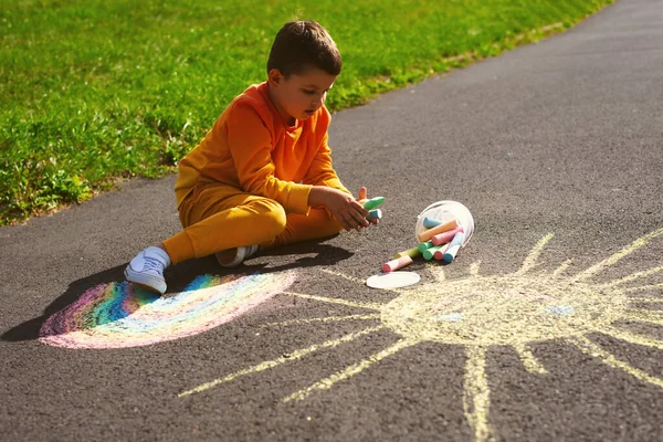 Little Seven Year Old Boy Orange Tracksuit White Sneakers Draws — Stock Photo, Image