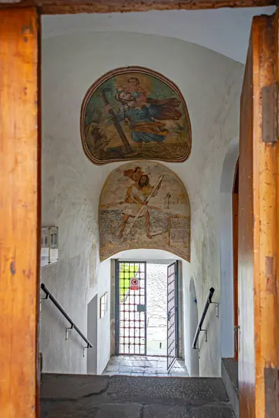 stock image Quito, Pichincha, Ecuador - November 20, 2013: Two ceiling paintings walking down stairs in between gardens. San Francisco convent.