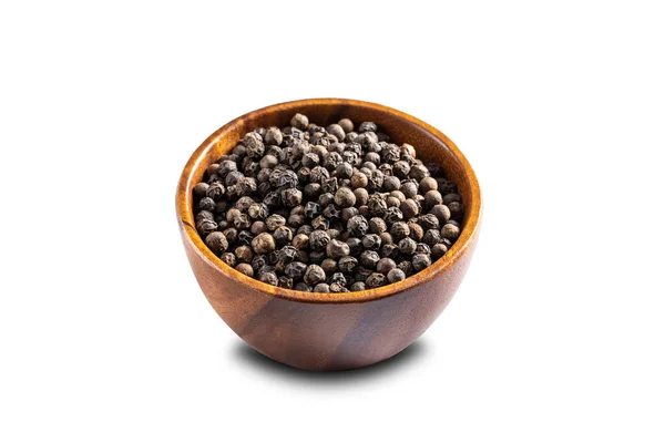 Black pepper seeds bowl. 45 degrees studio shoot isolated on white background.