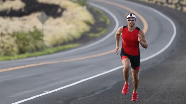 Triathlete Running Triathlon Suit Training Ironman Male Runner Exercising Running — Stock Video