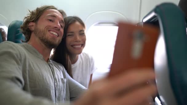 Couple Plane Travel Taking Selfie Photo Video While Flying Vacation — Stockvideo