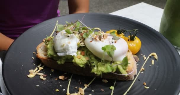 Avocado Toast Poached Egg Traditional Hipster Breakfast Brunch Meal — Stok Video