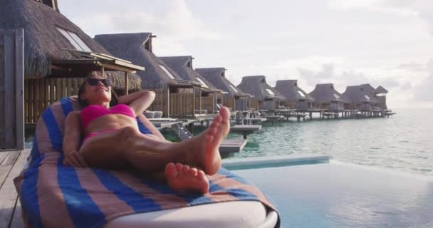 Travel Vacation Bikini Woman Relaxing Lying Lounger Chair Luxury Resort — Stock Video