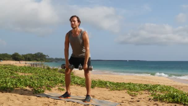 Fitness Man Exercising Doing Standing Dumbbell Upright Row Exercise Beach — Stock Video