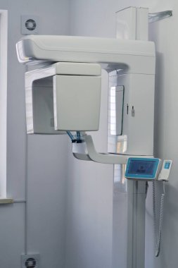 Tomografi X-View Trident dişçi parlak bir ofiste. Modern diş kliniği. Hastanedeki modern tıbbi malzemeler.. 