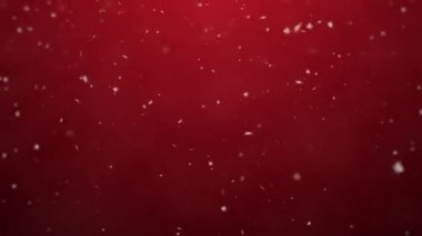 Kırmızı zemin üzerinde beyaz kar taneleri var. Kar yağışı, kar fırtınası, gerçekçi kar tepeden tırnağa kaotik bir şekilde yağar. Soyut festival eğilimli yeni yıl, Noel arkaplanı. 4k, 60fps, HD.