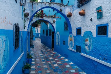 Chefchaouen, Morocco: The Blue City nestled in the Rif Mountains, famous for its charming blue-painted streets, serene ambiance, and cultural allure. High quality photo clipart