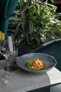 Salmon and avocado ceviche with cream cheese. Healthy diet food. copy space. Chilean traditional food