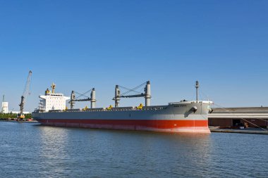 Antwerp, Belgium - August 2022: Large bulk carrier ship Sand Topic docked in the city's port to unload its cargo