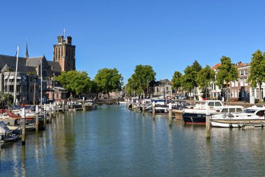 Dordrecht, Netherlands - August 2022: Boats and yachts moored in one of the city's harbours