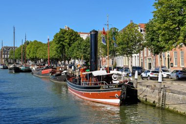 Dordrecht, Netherlands - August 2022: Vintage steam passenger ship Pieter Boele moored in one of the city's harbours
