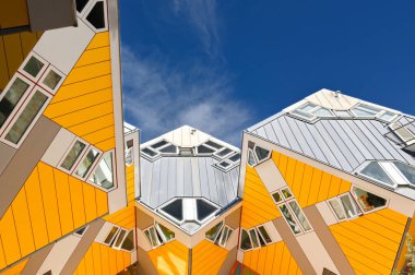 Rotterdam, Nertherlands - August 2022:  Cube houses in the city centre against a deep blue sky